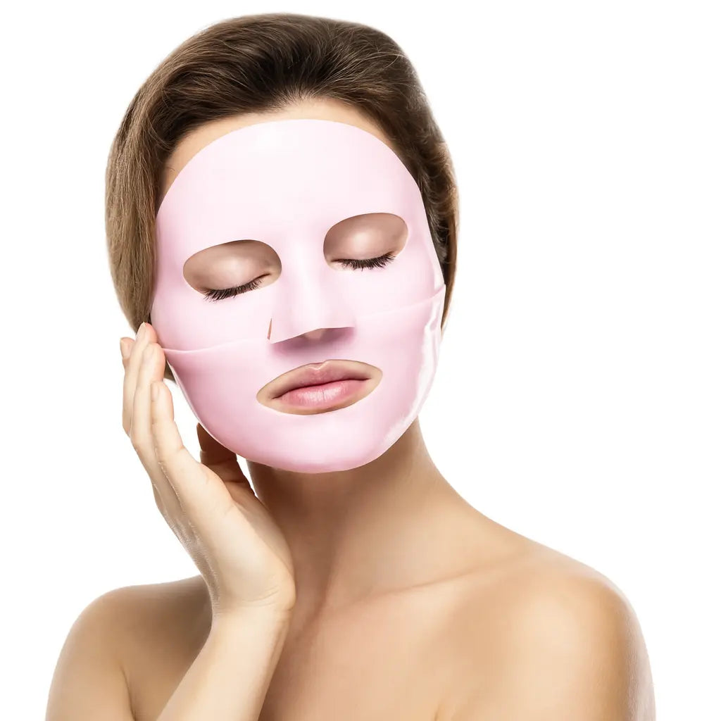 Woman wearing a pink face mask on a white background