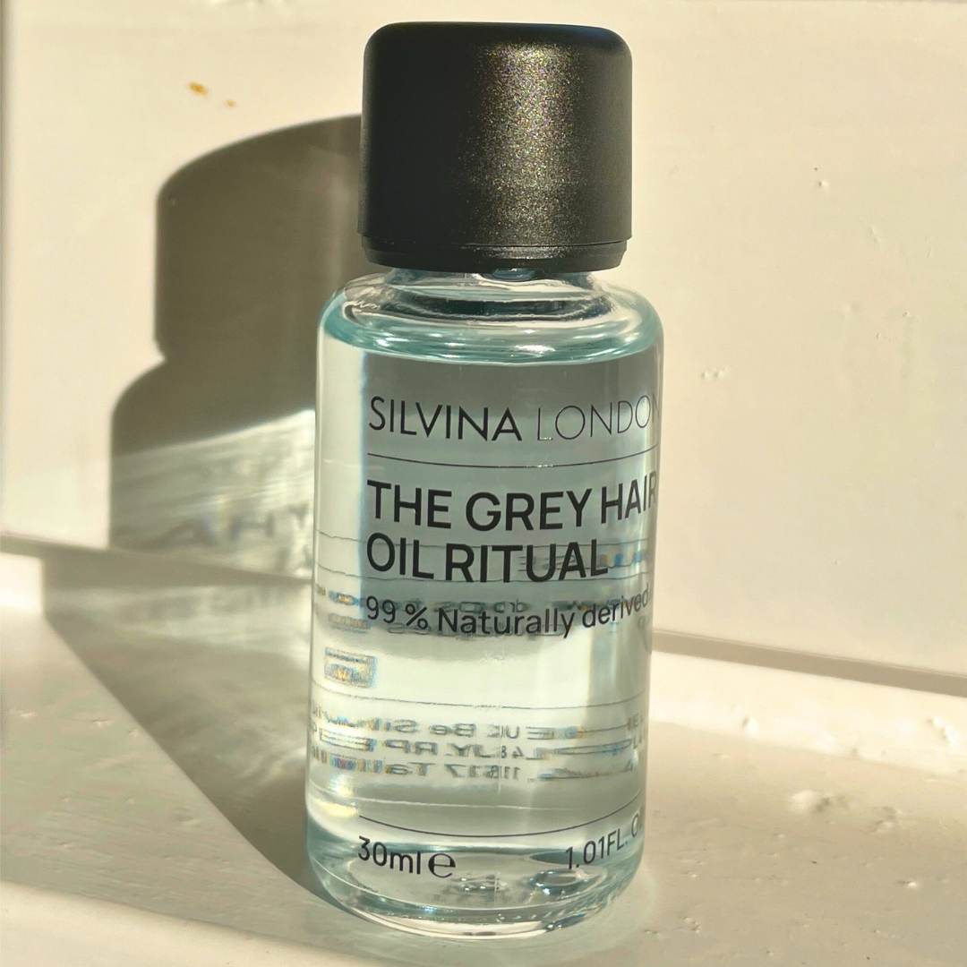 Bottle of Silvina London Grey Hair Oil Ritual on a light background