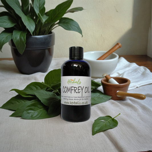 Comfrey Oil bottle placed on a light-colored tablecloth surrounded by fresh green leaves, a potted plant, and traditional herbal preparation tools in the background, showcasing a natural, organic, and healing aesthetic.