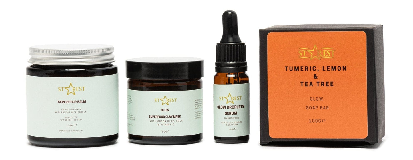 Starest Acne Control Set featuring Glow Soap, Clay Mask, Serum, and Repair Balm.