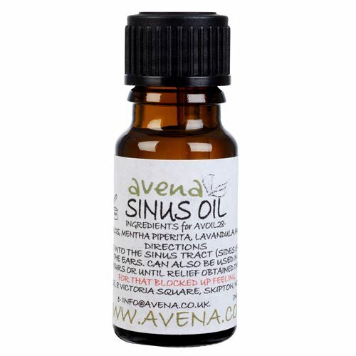 "Handheld bottle of Herbalshire Sinus Support Oil showing natural peppermint and lavender ingredients."